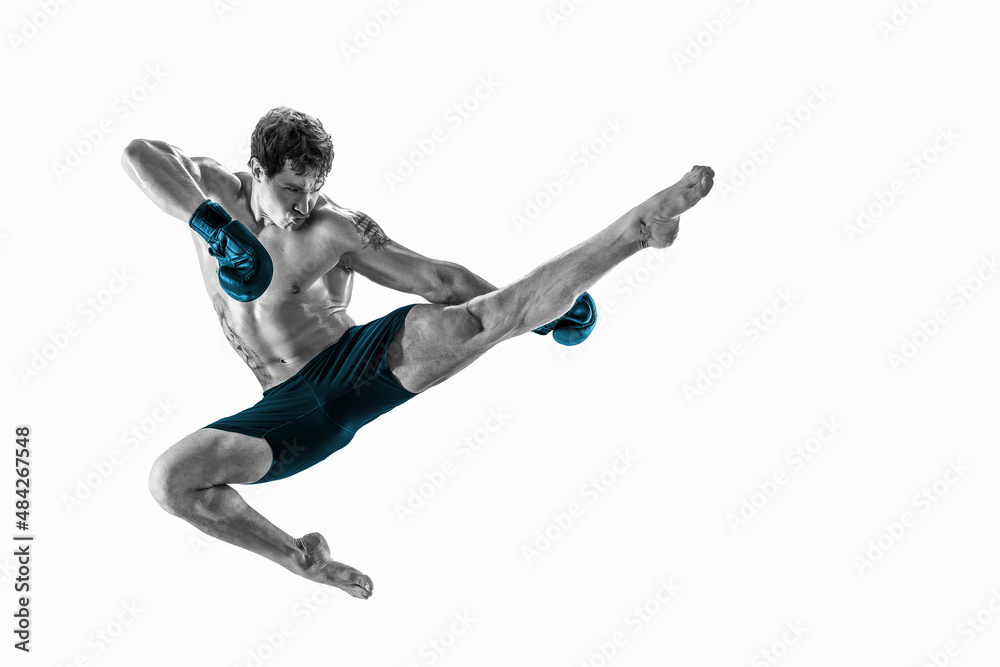 Full size of athlete boxer who perform muay thai martial arts in studio silhouette. BLUE sportswear 