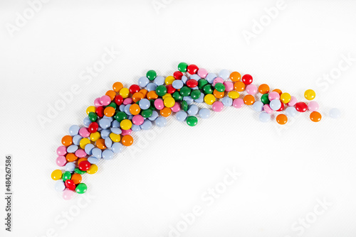 colorful easter decorative beads with red, blue, yellow, green and other colors on white background in long shape