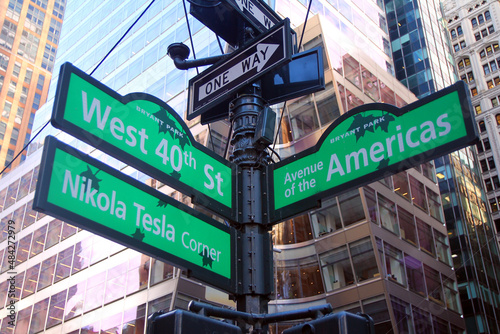 Green West 40th Street and Avenue of the Americas 6th ( Nikola Tesla corner ) Bryant Park traditional sign in Midtown Manhattan in New York City © willeye