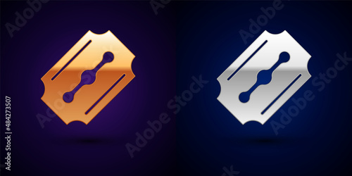 Gold and silver Blade razor icon isolated on black background. Vector