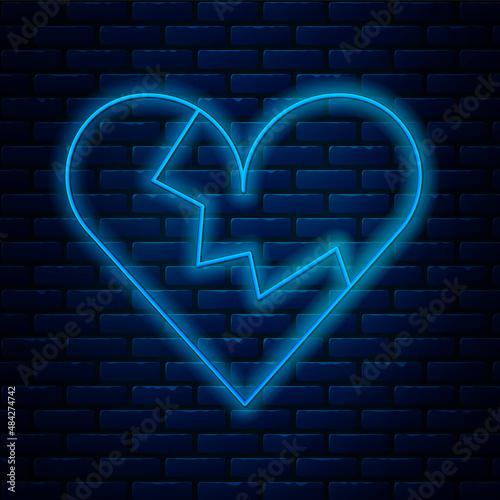 Glowing neon line Broken heart or divorce icon isolated on brick wall background. Love symbol. Valentines day. Vector