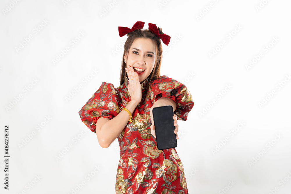Happy chinese new year. excited young Woman showing blank smart phone screen Happy chinese new year. excited young Woman showing blank smart phone screen