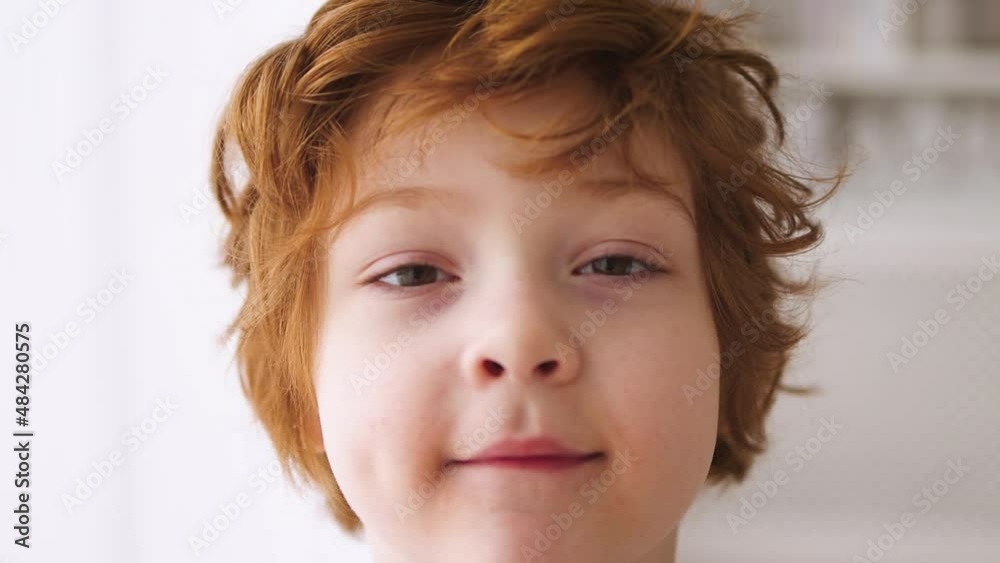 closeup of redhead boy's face. Five years old kid closeup of redhead boy's face. Five years old kid
