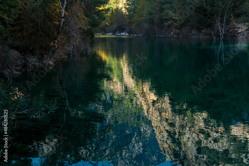 Fototapeta Naklejka Na Ścianę i Meble -  autumn mountain landscape with shady lake in the gorge