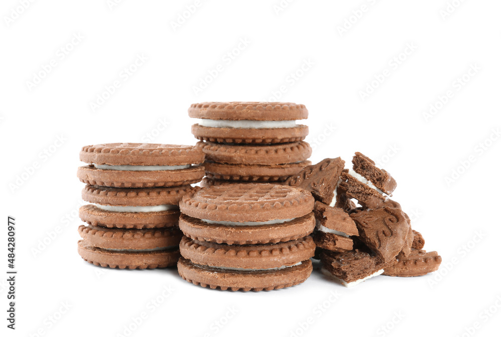 Tasty chocolate sandwich cookies with cream on white background Tasty chocolate sandwich cookies with cream on white background