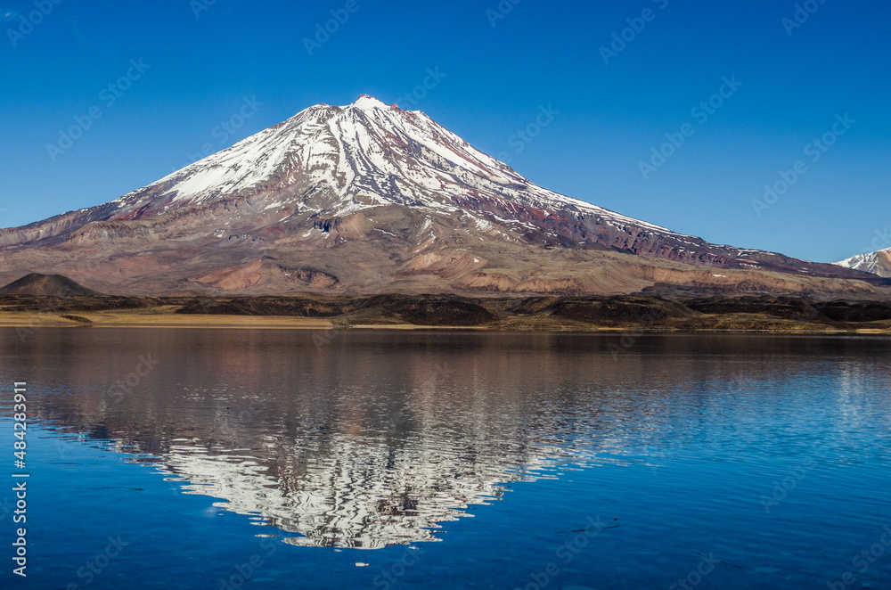 mirror lake with volcano reflection