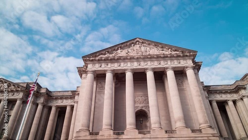 Time-lapse of clouds passing over the south pediment of the William Jefferson Clinton Federal Building, headquarters of the U.S. Environmental Protection Agency. The camera pans left to right.  photo
