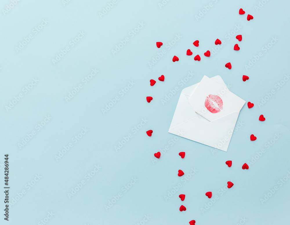 Flat lay of paper envelope with blank mockup greeting card. Grey table background with Valentine day gift, letter, heart shape and decoration. Top view, mock up invitations Flat lay of paper envelope with blank mockup greeting card. Grey table background with Valentine day gift, letter, heart shape and decoration. Top view, mock up invitations