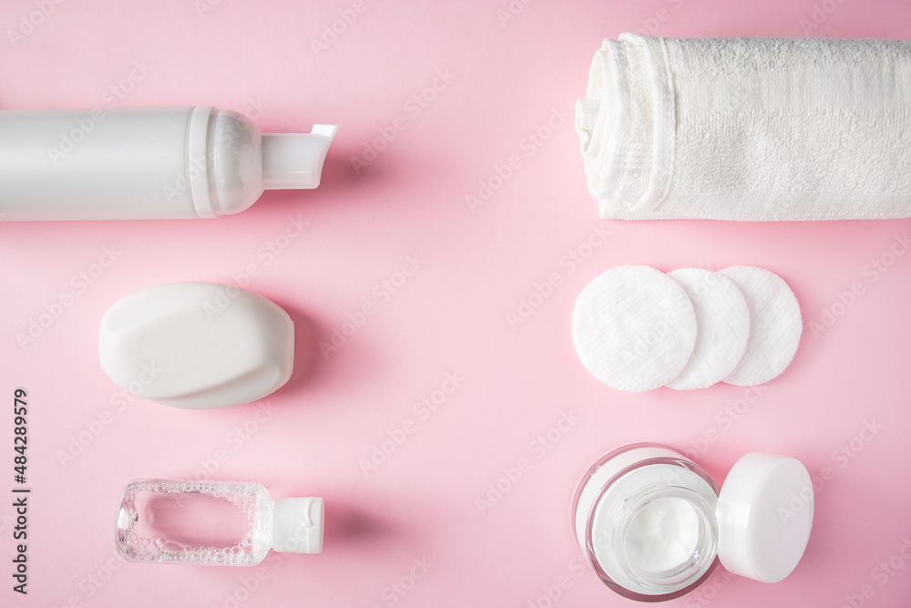 Cosmetic products on pink background. Spa accessories, body care. Wellness concept. Cosmetic products on pink background. Spa accessories, body care. Wellness concept.