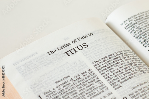 Photo Titus letter open Holy Bible Book isolated on white background