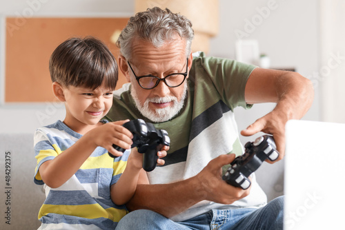 Little boy with his grandfa...