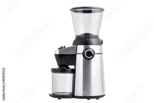 electric professional coffee grinder with conical burr and container for bean with selector grinder regulator, object of gray steel and black plastic and transparent flask side view isolated on white.