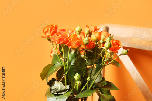 Wallpaper Mural Bouquet of beautiful orange roses on color background Torontodigital.ca