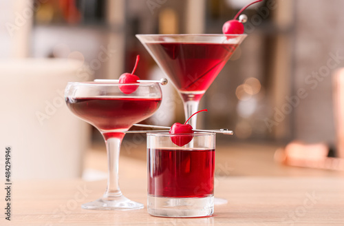 Glasses of tasty Manhattan cocktail on table © Pixel-Shot