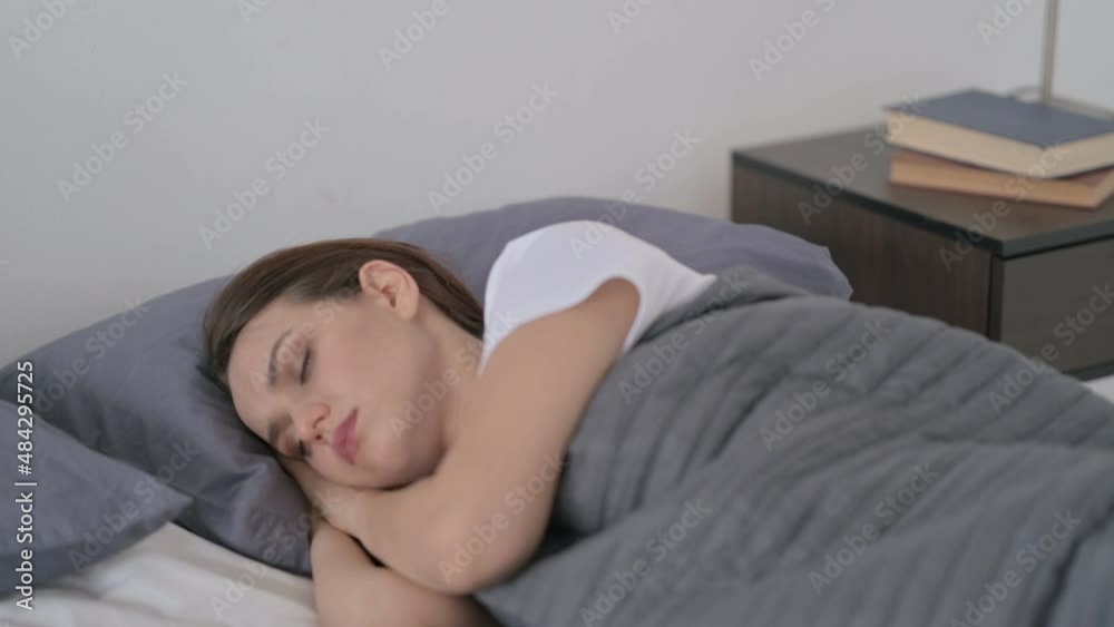 Woman Feeling Uncomfortable while Sleeping in Bed Woman Feeling Uncomfortable while Sleeping in Bed