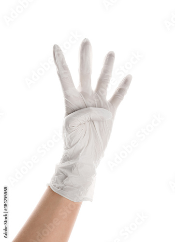 Woman in medical glove showing four fingers on white background © Pixel-Shot