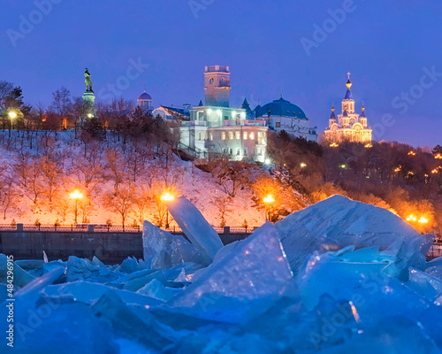 Evening lights of Khabarovsk. Amur river embankment in winter. Far East, Russia.