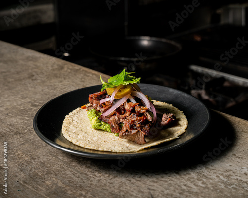haute cuisine culinary taco of arrachera with avocado