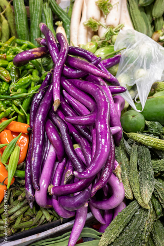 Sicilian long purple eggplants vegetables for sale at Itallian market photo
