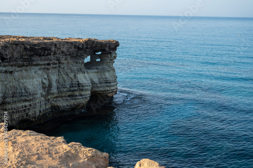 National park Cape Greko, view on natural sea caves and turquoise water of Mediterranean Sea, Cyprus photo