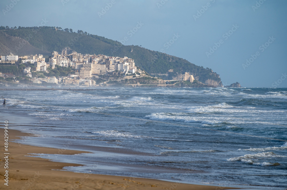 Water sport at cold winter water of Tyrrhenian sea between two touristic towns Sperlonga and Terracina in Lazio, Italy Water sport at cold winter water of Tyrrhenian sea between two touristic towns Sperlonga and Terracina in Lazio, Italy