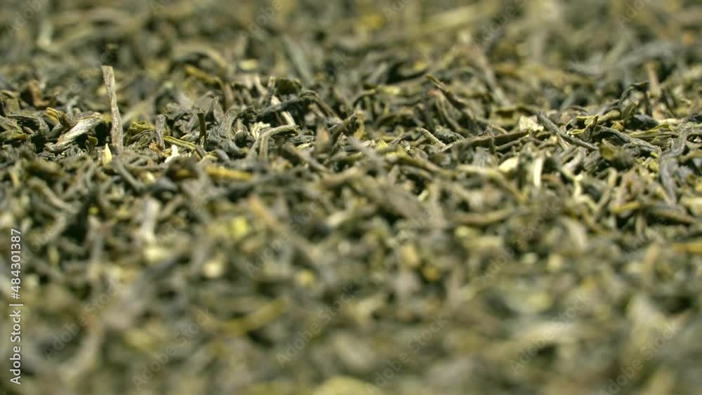 Green tea leaves rotation background. Close up Green tea leaves rotation background. Close up