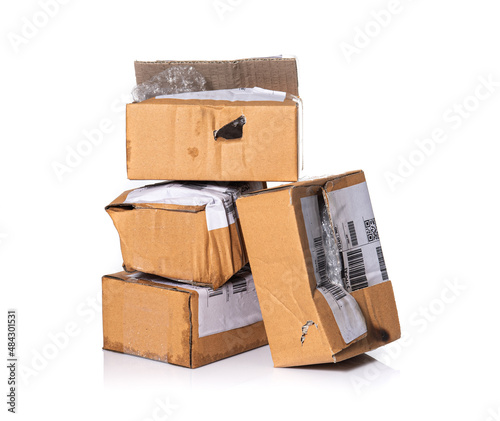 damaged cardboard parcel on white background