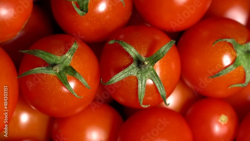 Fresh ripe tomatoes rotation background. Close up. Loop motion