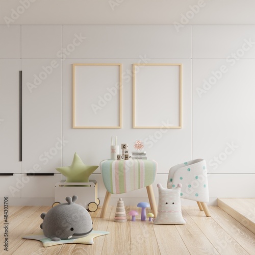 Mockup frame photo in the children's room, bedroom interior on wall white color background. © Vanit่jan