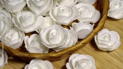White decorative roses, rotation background. Close up