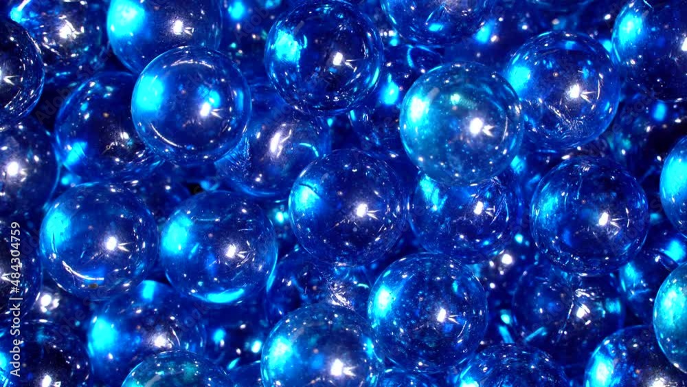 Abstract blue glass balls rotation background
