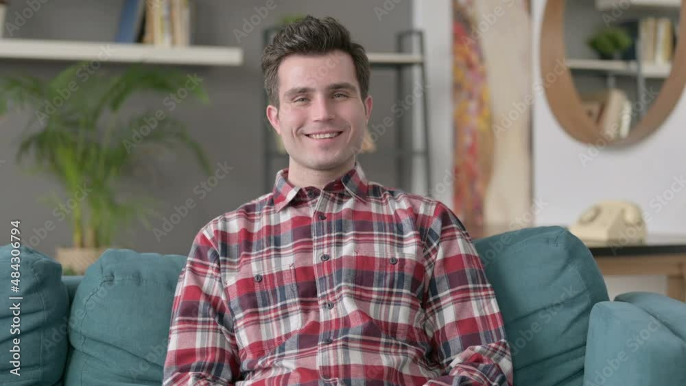 Portrait of Man Smiling at the Camera, Sofa Portrait of Man Smiling at the Camera, Sofa