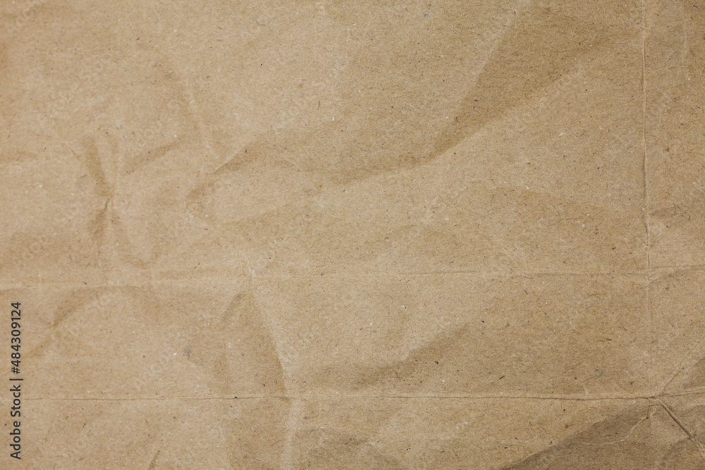 Old torn crumpled paper bag texture background. Old torn crumpled paper bag texture background.