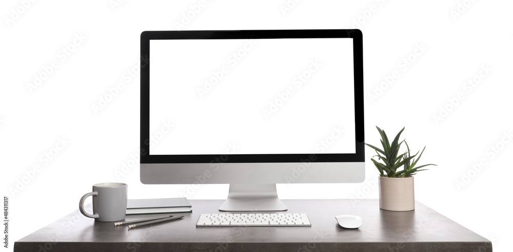 Table with modern computer, decor and stationery on white background