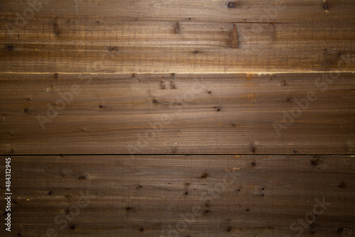 Rustic background texture of real old wood board wall planks with scratches and scrapes. 