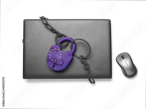 Laptop locked with chain and padlock. EU