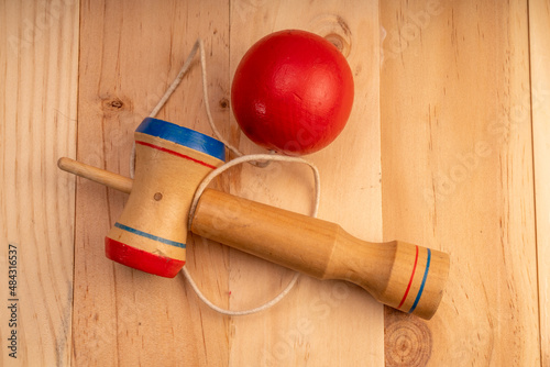 The kendama sword and ball is a traditional Japanese skill toy.  photo