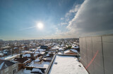 SOUTH Etobicoke by browns line  sun shining close to sunset  with houses with snow tops 