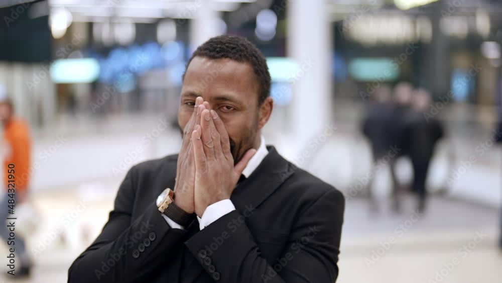 guy is laughing happily to camera, portrait of african man, cheerful and joyful person guy is laughing happily to camera, portrait of african man, cheerful and joyful person