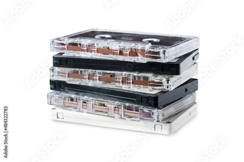A lot of old audio cassettes. Isolated on white.