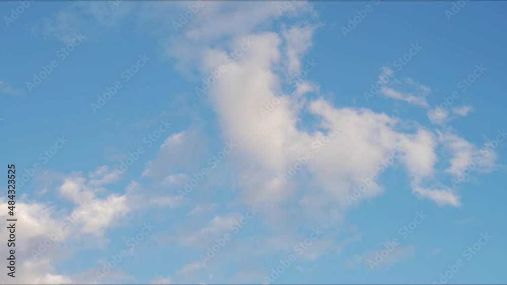 Timelapse of blue sky white clouds. Puffy fluffy white clouds. White clouds background. Cloud timelapse nature background. Timelapse of blue sky white clouds. Puffy fluffy white clouds. White clouds background. Cloud timelapse nature background.