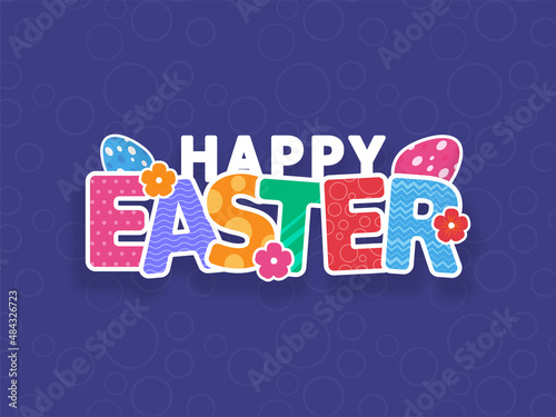 Colorful Happy Easter Font With Eggs, Flowers On Blue Circle Pattern Background.