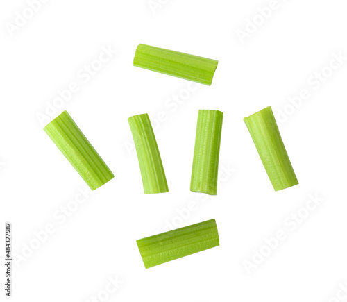 Cut celery sticks on white background
