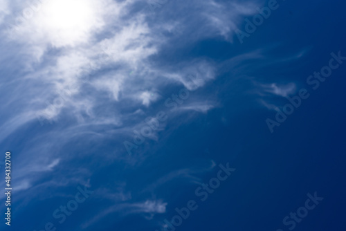 High cirrus clouds against the blue sky © svetograph