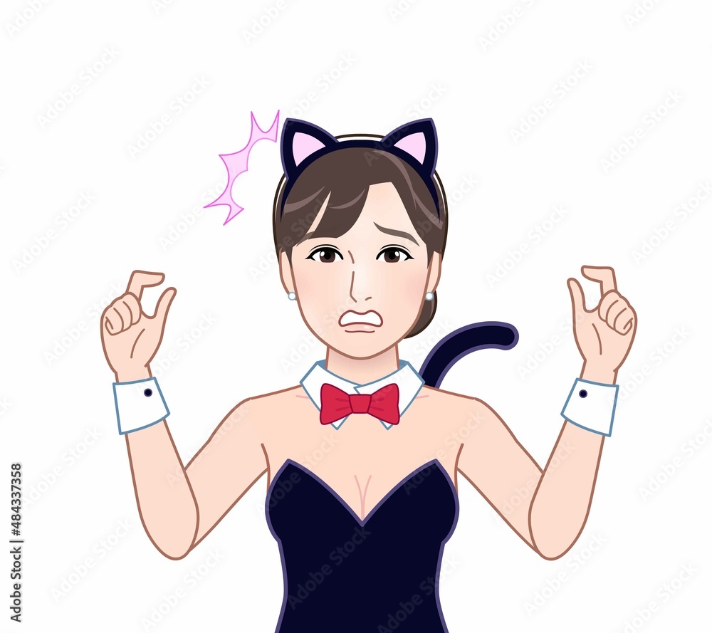 猫の格好をした若い女性 猫の格好をした若い女性