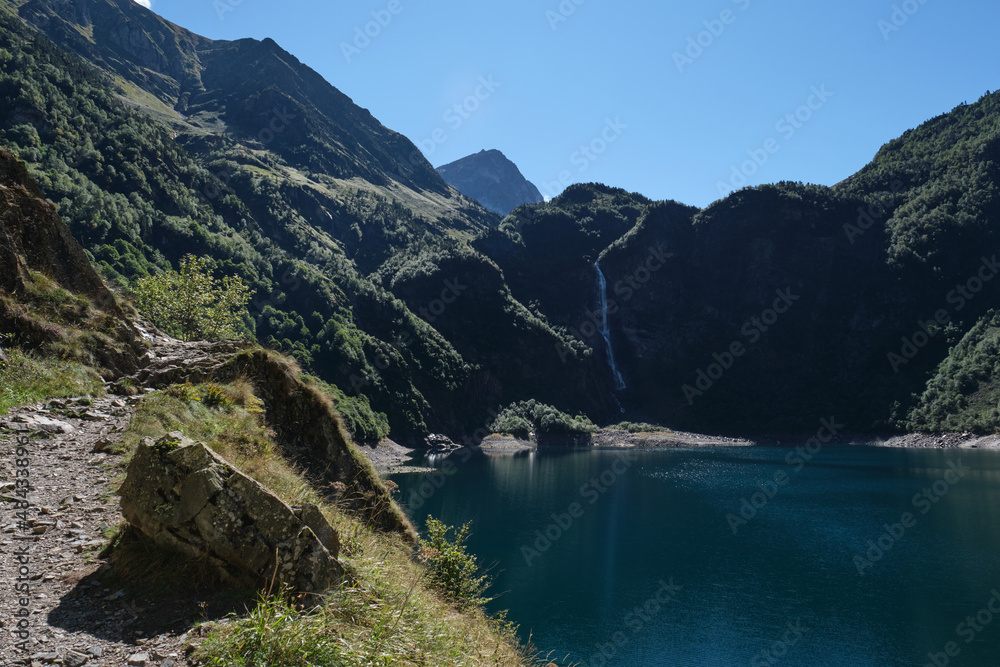 mountain trail by the lake. Lac d'Oô, French Pyrenees.