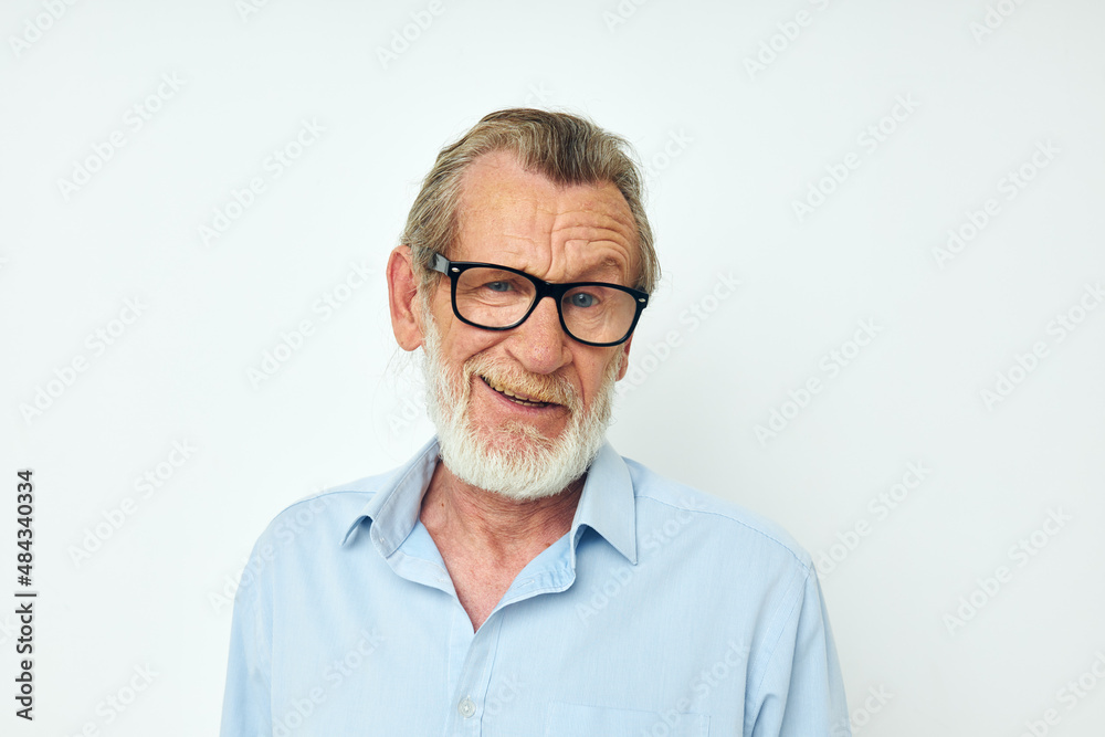 Photo of retired old man in shirt and glasses posing emotions isolated background
