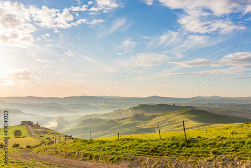 Italian rolling rural landscape with morning mists