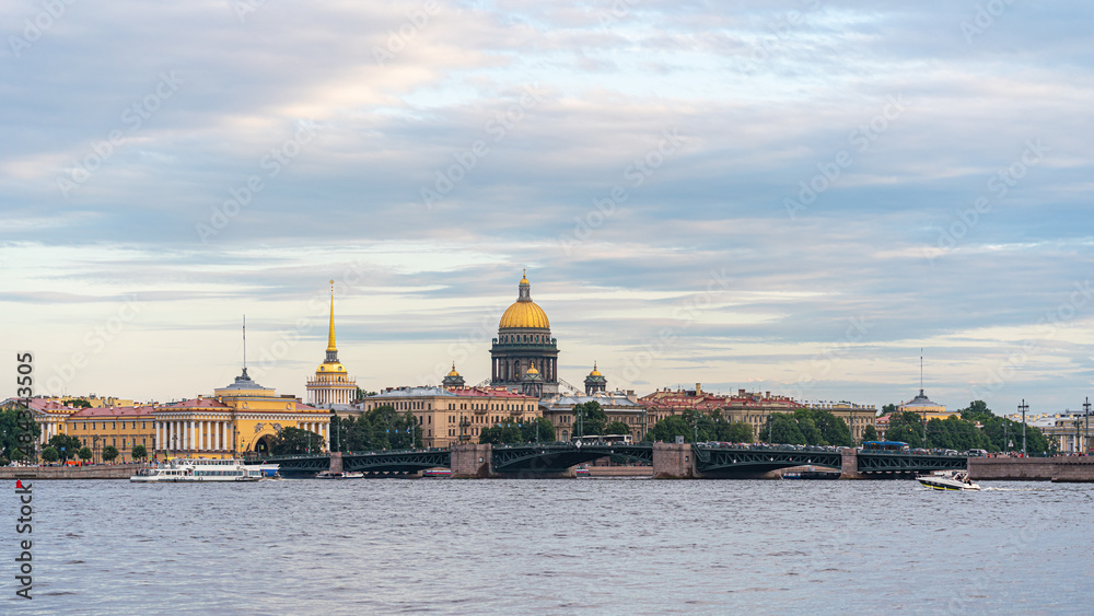 St. Petersburg, Russia - August 14, 2020: view of the Neva River, the buildings of the Admiralty and St. Isaac's Cathedral, and the Palace Bridge. Panorama