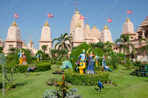 Radha and Krishna idols in different poses in garden of Nilkanthdham, Swaminarayan temple, Poicha, Gujarat, photo